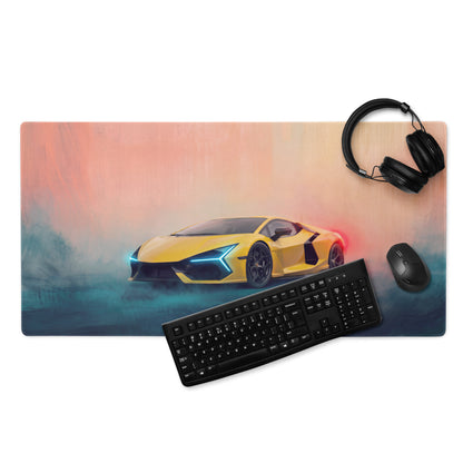 Yellow lamborghini sports car graphic on black stitched edge ultra-glide gaming mousepad with keyboard and headset nearby