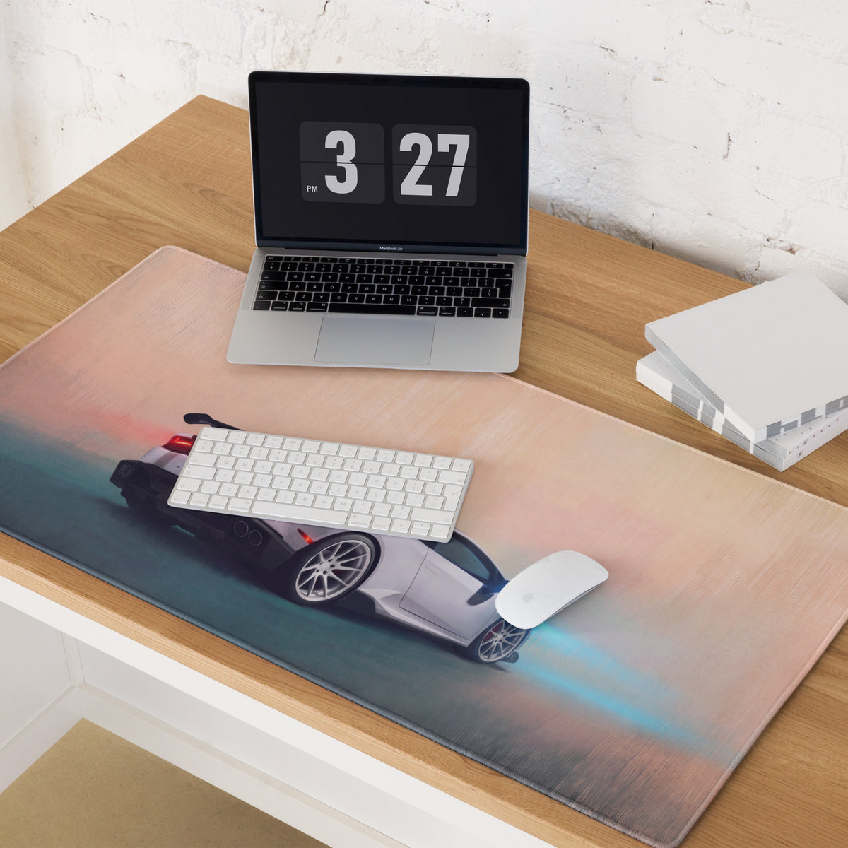 A sleek rectangular Lamborghini Huracán inspired pearl apex desk pad with a silver sports car graphic and non-slip base