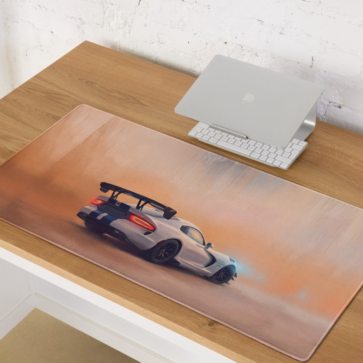 Dodge Viper ACR inspired blue stripe desk pad featuring a white sports car print with stitched edge for ultra-glide use