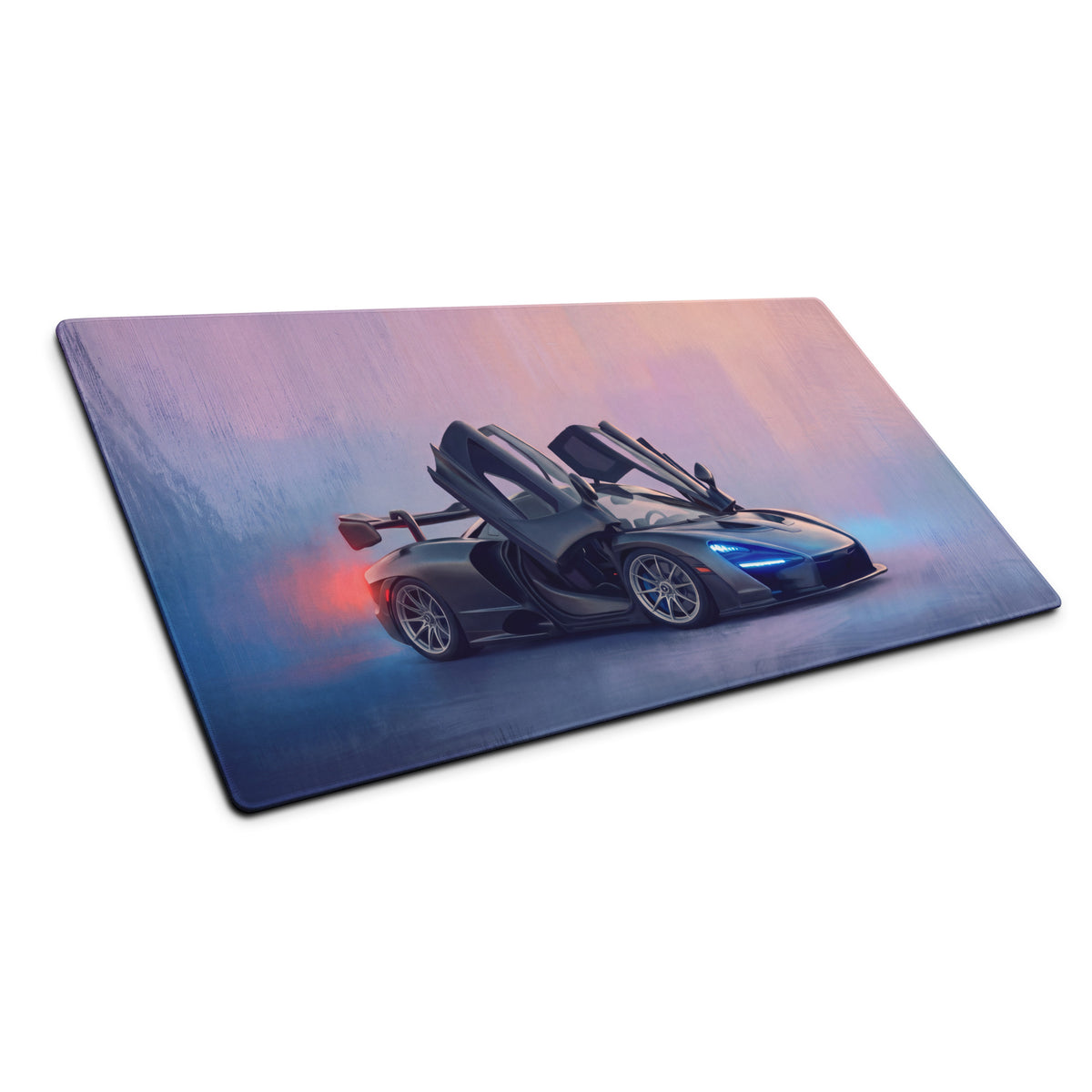 Black mclaren sports car graphic on a low-friction cloth mousepad with vibrant purple and blue gradient background