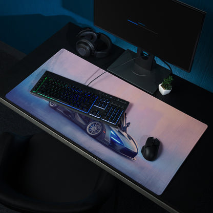 A sleek rectangular low-friction cloth gaming mousepad with a blue and silver mclaren senna sports car graphic