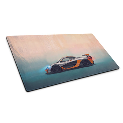Silver and orange mclaren p1 graphic printed on a low-friction cloth track edition desk mat for mouse setup