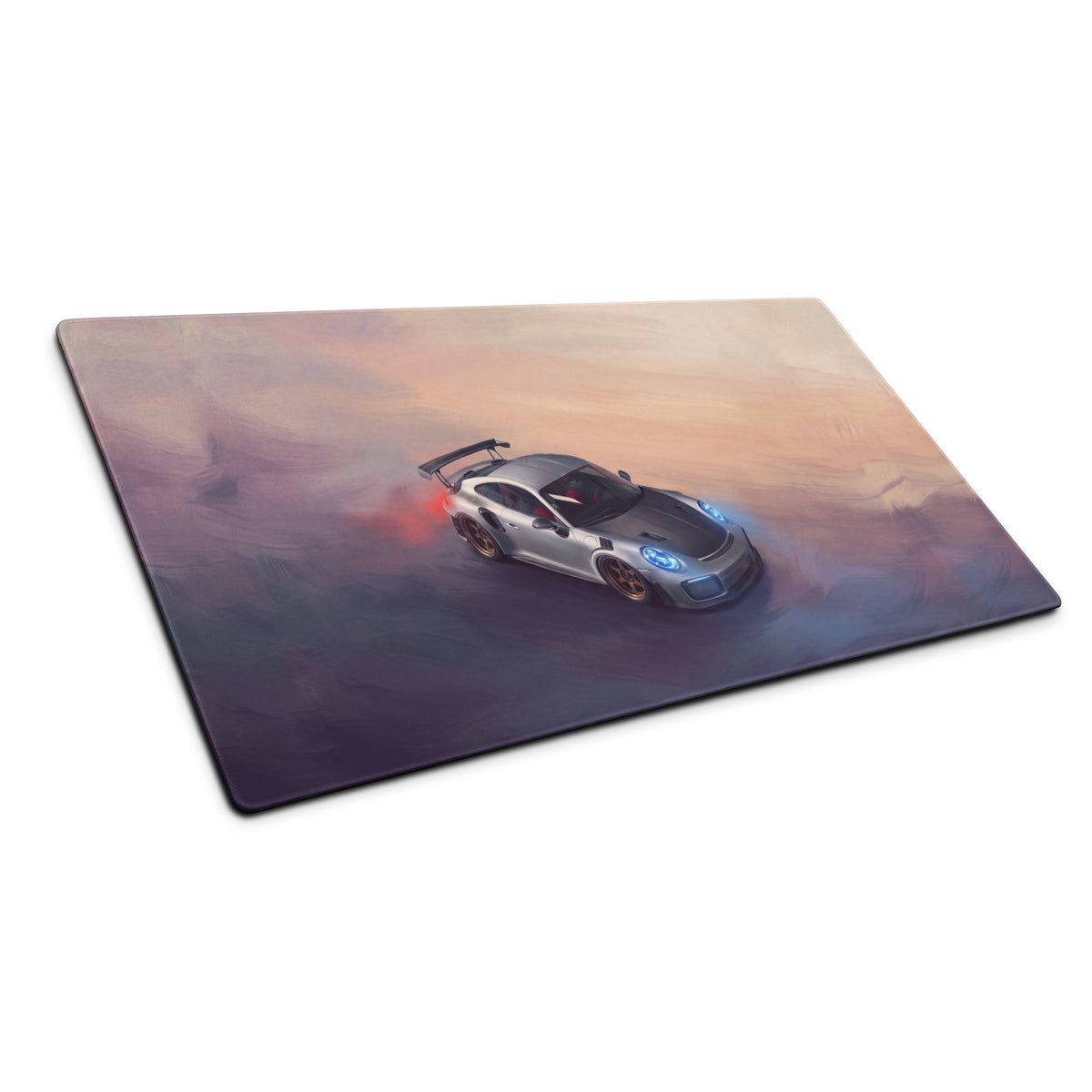 Silver Porsche 911 GT2 RS inspired Weissach desk pad with stitched edge featuring glowing headlights and red exhaust flames