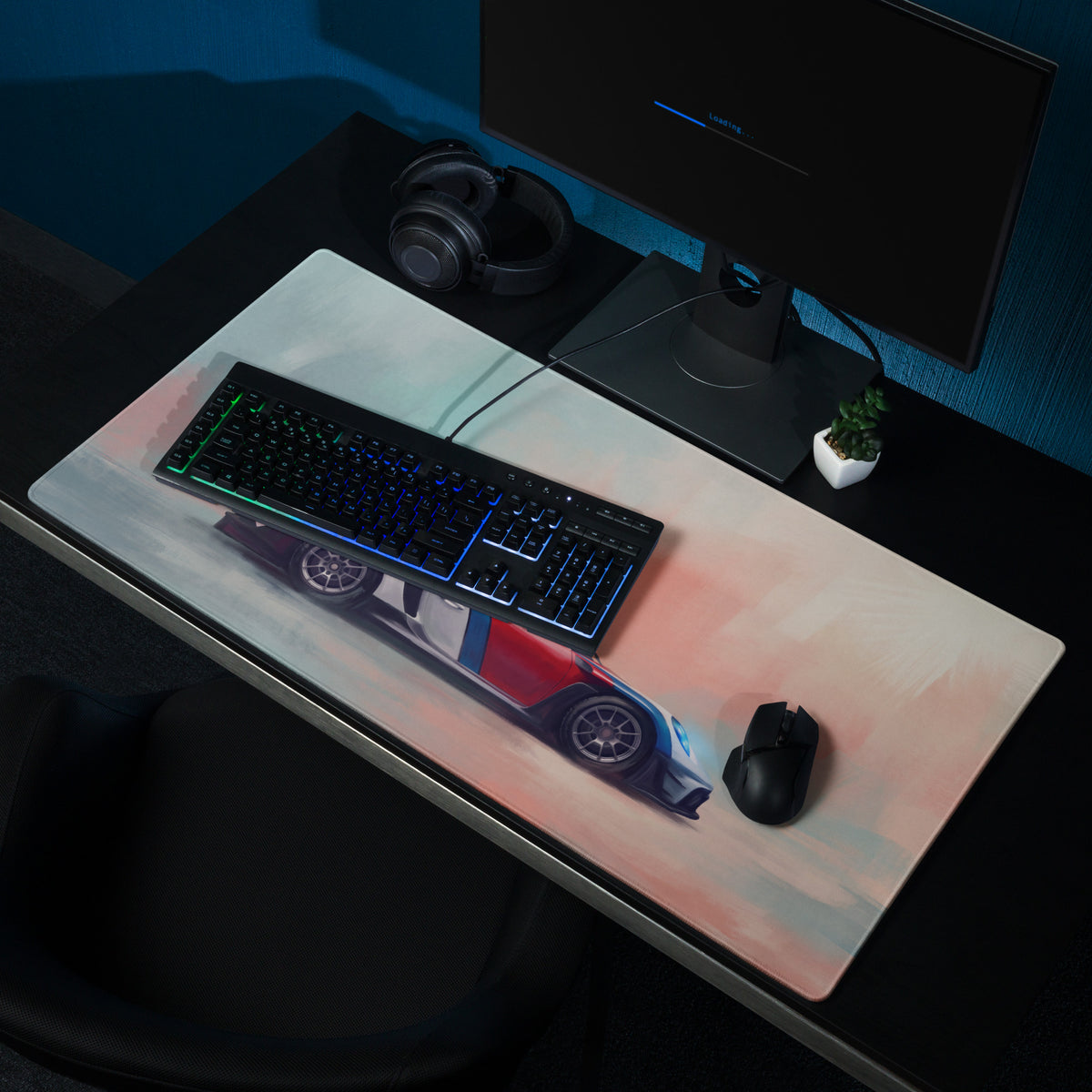Porsche 911 inspired heritage livery desk mat with vibrant red and blue racing car illustration on low-friction cloth
