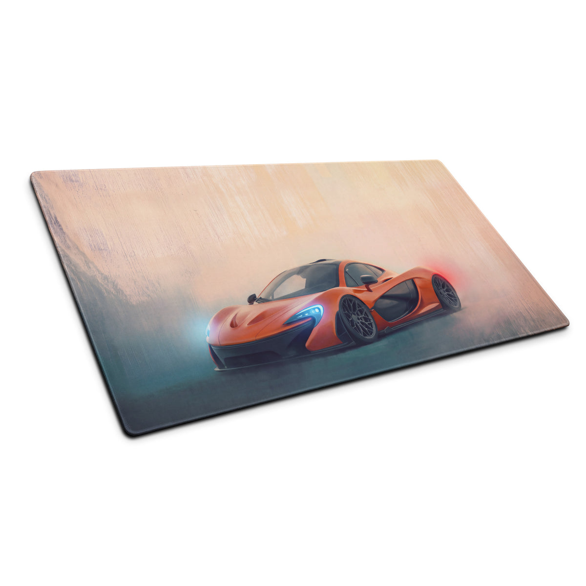 Orange McLaren P1 sports car graphic printed on a glossy rectangular volcano horizon desk pad with stitched edges