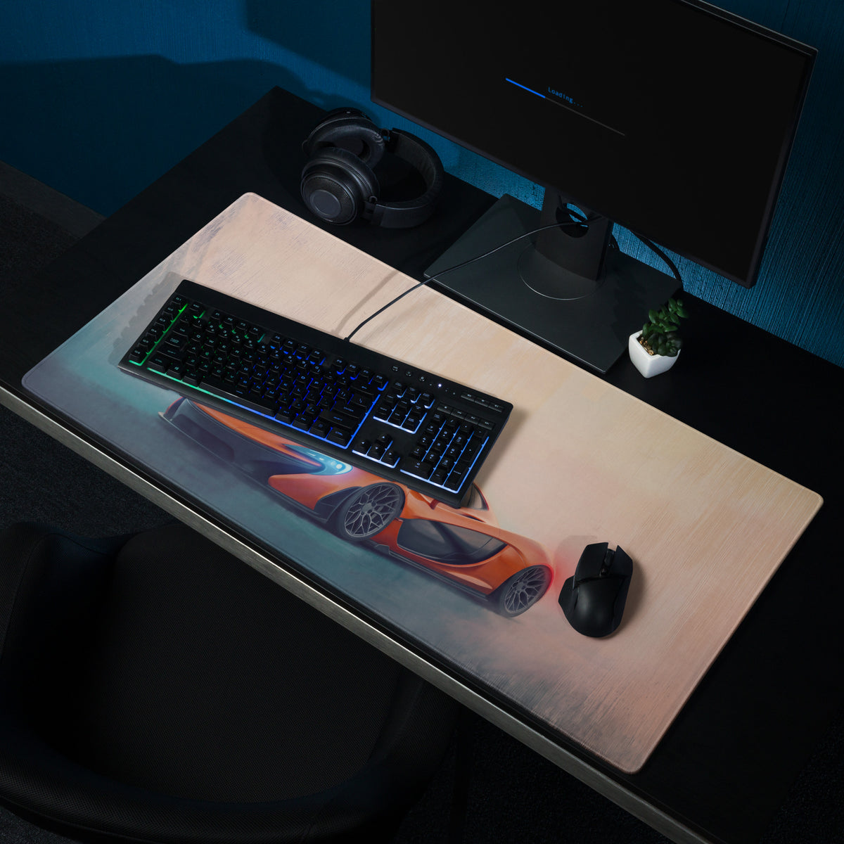Orange sports car graphic on smooth textured rectangular McLaren P1 inspired volcano horizon gaming mousepad