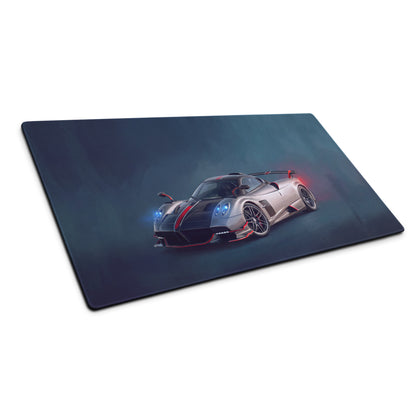 A sleek rectangular low-friction cloth mousepad featuring a silver and black pagani huayra bc with glowing blue headlights
