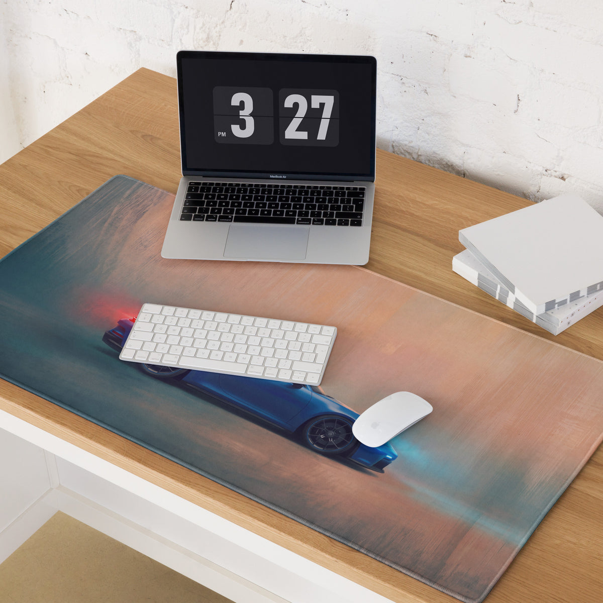 Porsche 911 gt3 inspired shark blue profile desk pad featuring a blue sports car racing scene on stitched edge surface