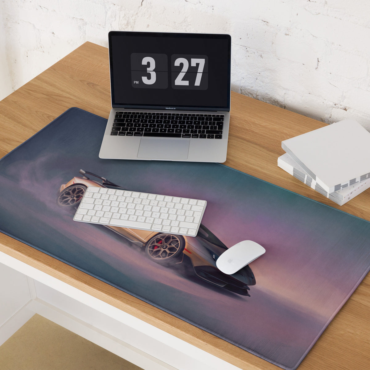 A sleek rectangular non-slip desk mat featuring two bronze Lamborghini Aventador SVJ cars against a gradient sky