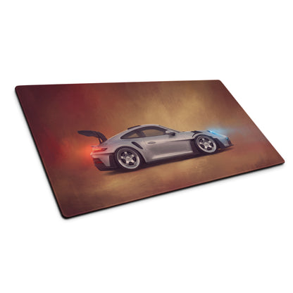 Silver Porsche 911 GT3 RS inspired sports car graphic printed on a warm gradient ultra-glide stitched edge desk pad