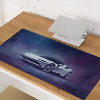 A sleek xl gaming mousepad with a white sports car illustration on a gradient blue and purple background