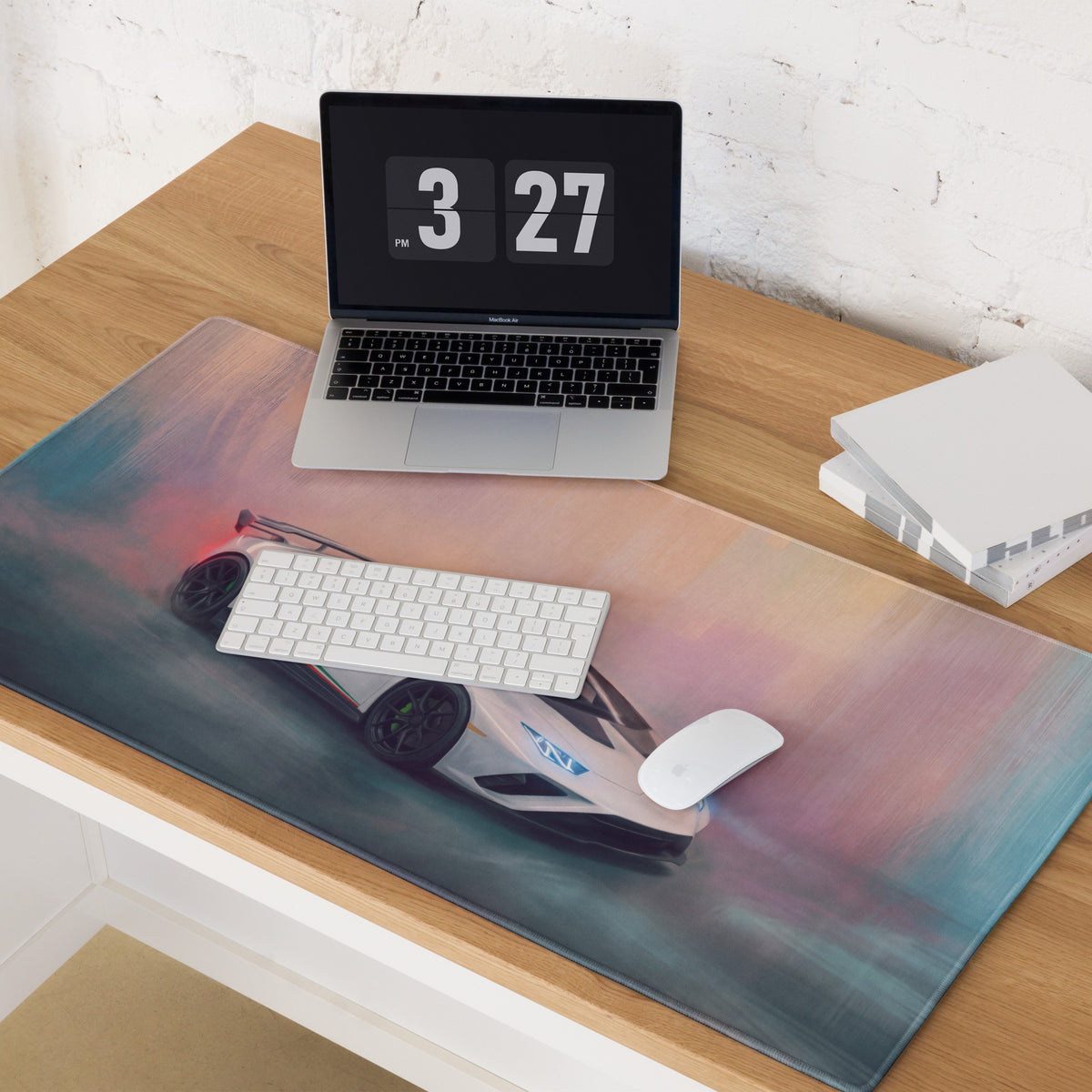 A sleek rectangular gaming mousepad with stitched edges featuring a white lamborghini huracán speeding through a colorful sky