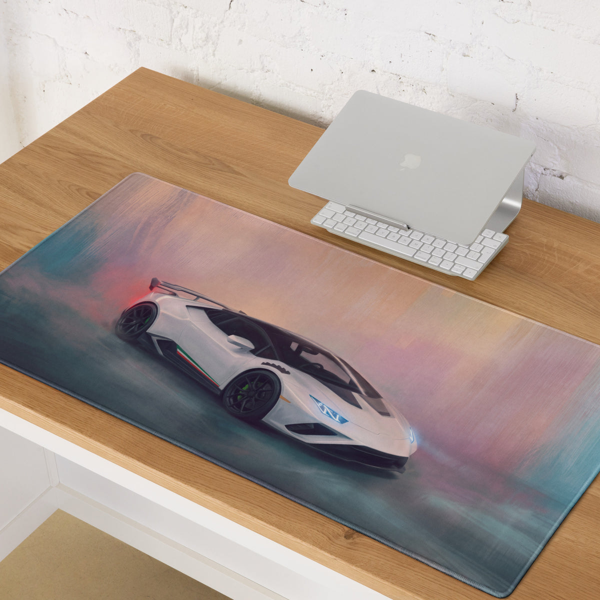 A sleek white Lamborghini Huracán graphic on a pastel gradient stitched edge gaming desk pad mouse mat