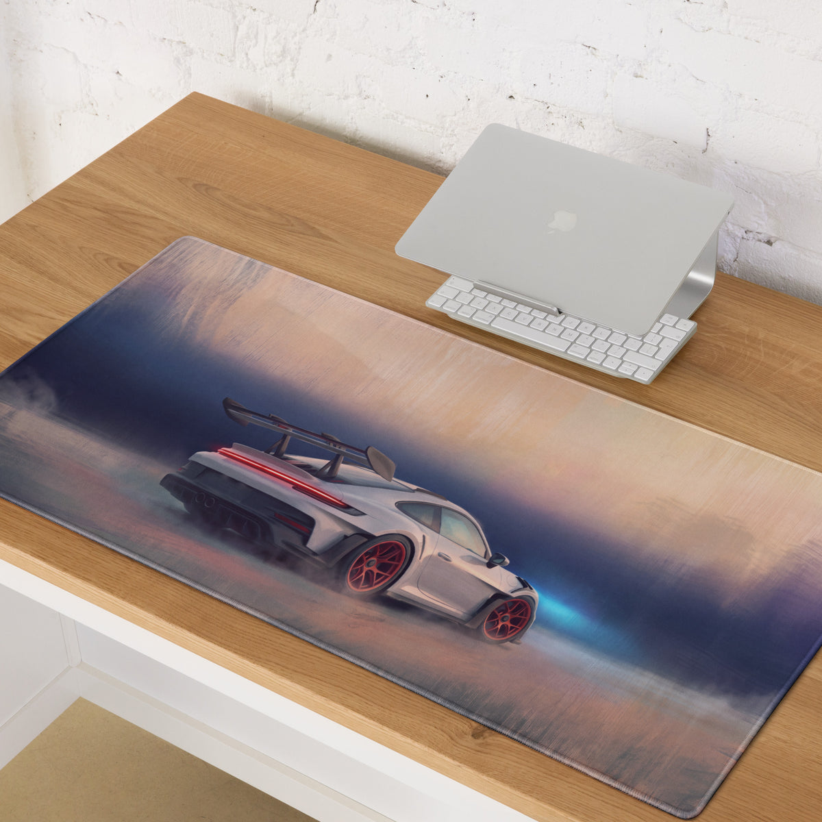 Silver Porsche 911 gt3 rs inspired desk mat with red wheels on low friction cloth gaming mousepad surface