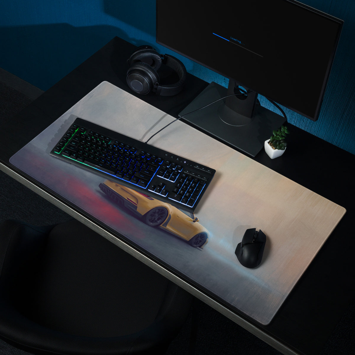 A sleek rectangular high-precision xl gaming mousepad featuring a vibrant yellow Porsche 911 GT3 sports car graphic