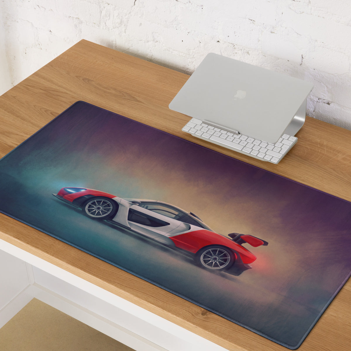 Red and white mclaren senna inspired marlboro heritage desk mat with low friction cloth and dark gradient background