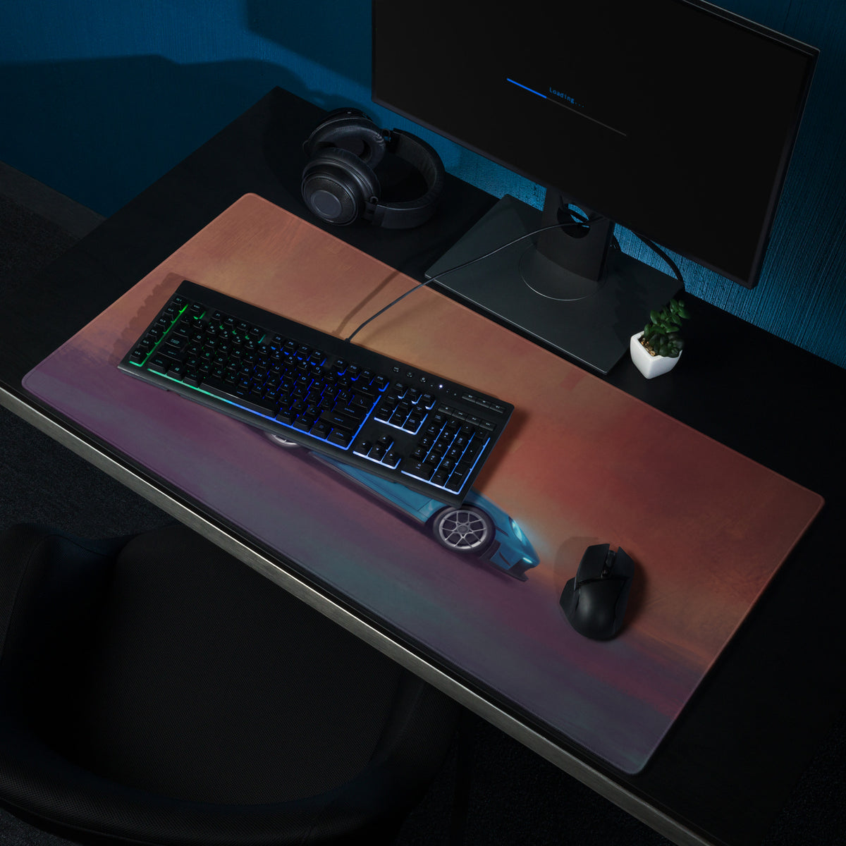 A sleek rectangular Porsche 911 GT3 inspired Miami Blue gaming mousepad with warm orange to cool blue gradient and illuminated car graphic