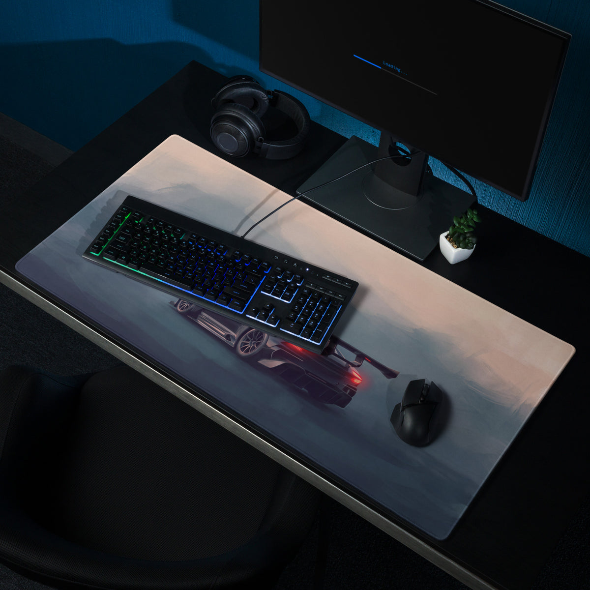 Aston Martin Vulcan inspired onyx track desk mat with a dark sports car print and low-friction cloth surface