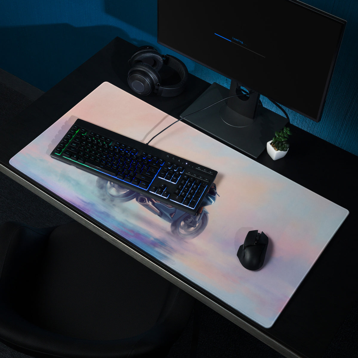 A sleek rectangular gaming mousepad with a vibrant gradient and illustrated futuristic motorcycle design