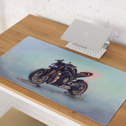 A sleek rectangular ducati streetfighter v4 inspired desk mat with black and gold motorcycle illustration and smooth surface