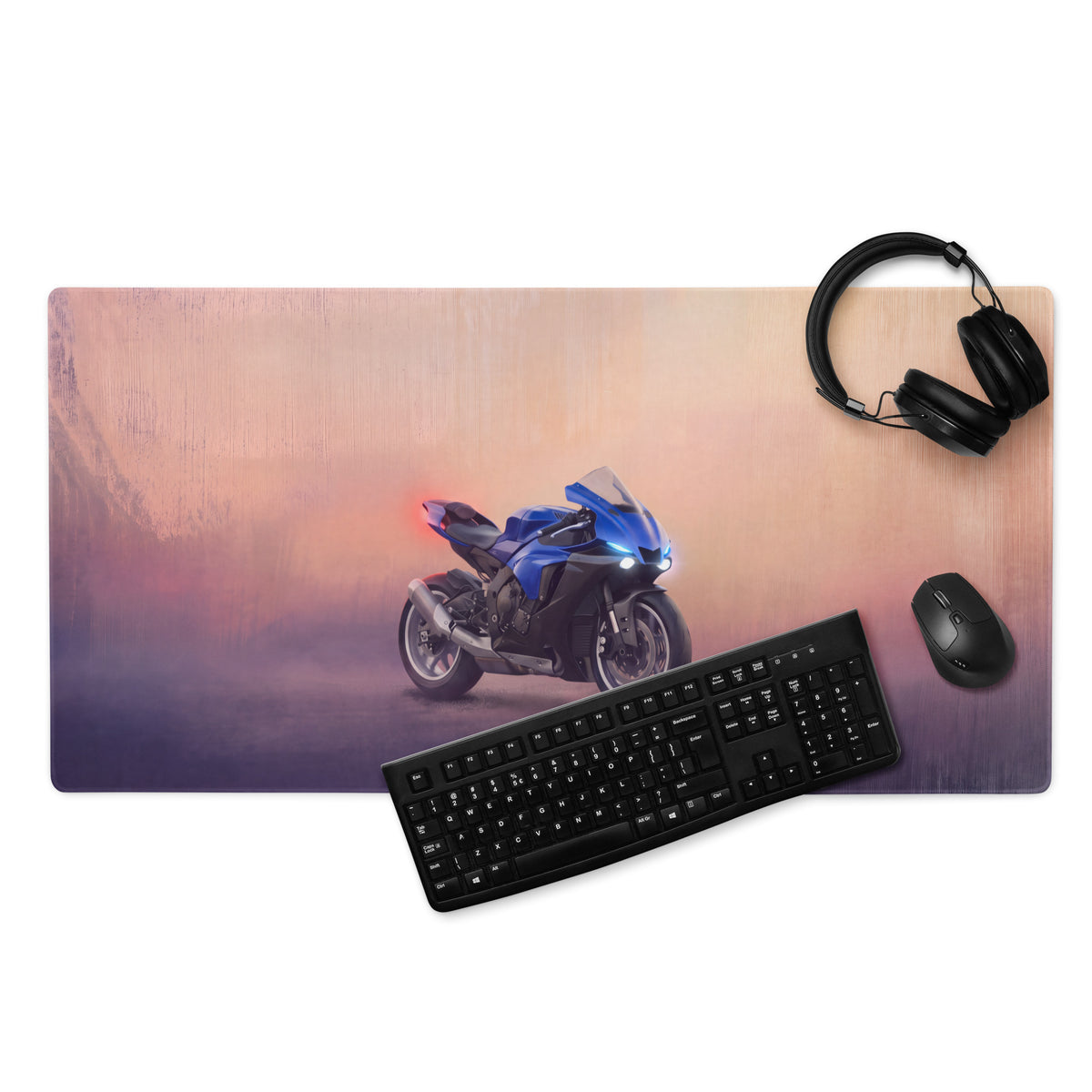 Blue and black racing motorcycle graphic on yamaha yzf-r1 inspired extended desk mat with pink to purple gradient background