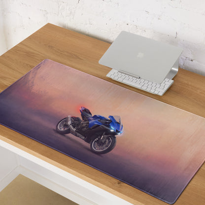 Rectangular soft-textured mousepad with blue and black yamaha yzf-r1 motorcycle graphic on pink to purple gradient background
