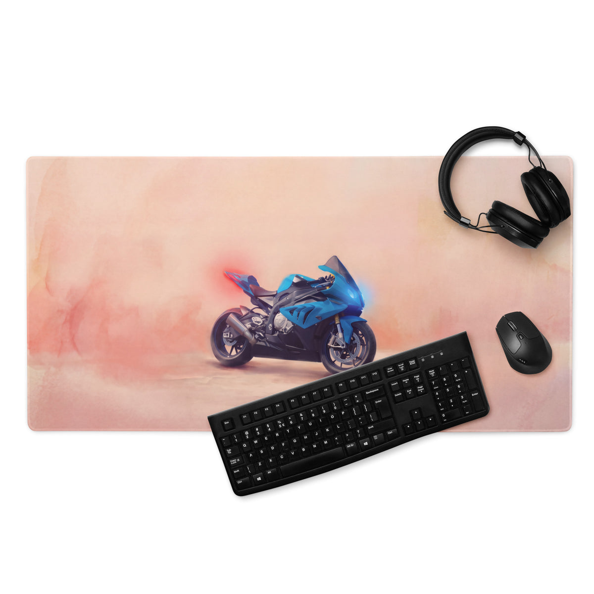 Blue motorcycle graphic on a pink watercolor style waterproof large mouse pad for racing desk accessory use