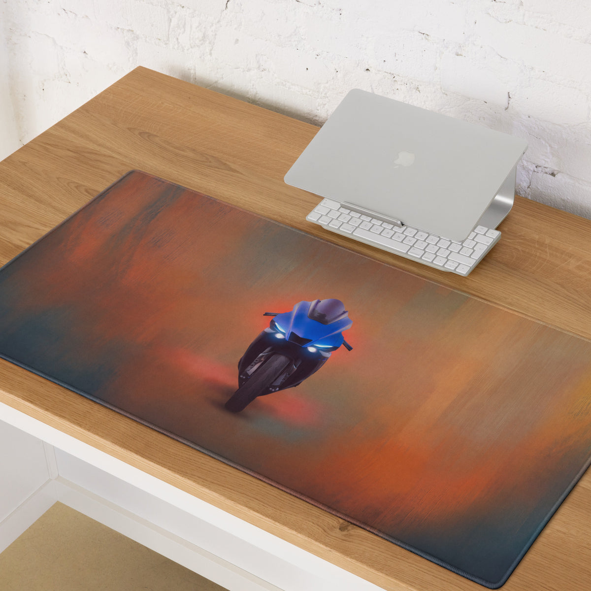 Blue yamaha yzf-r1 inspired large gaming mousepad with glowing headlights on gradient orange and dark background