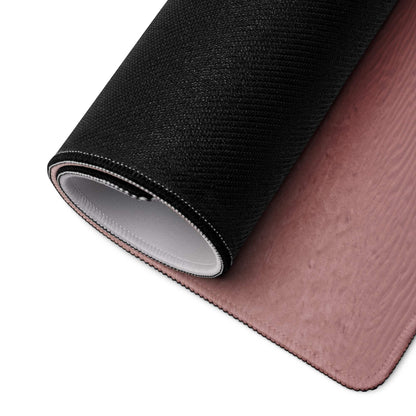 Rolled-up Desert Dune Pink large gaming mouse pad with stitched edge