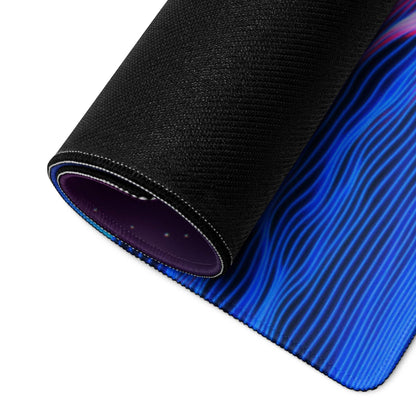 Rolled-up Neon Sunset Mountain gaming mouse pad with cosmic blue purple design