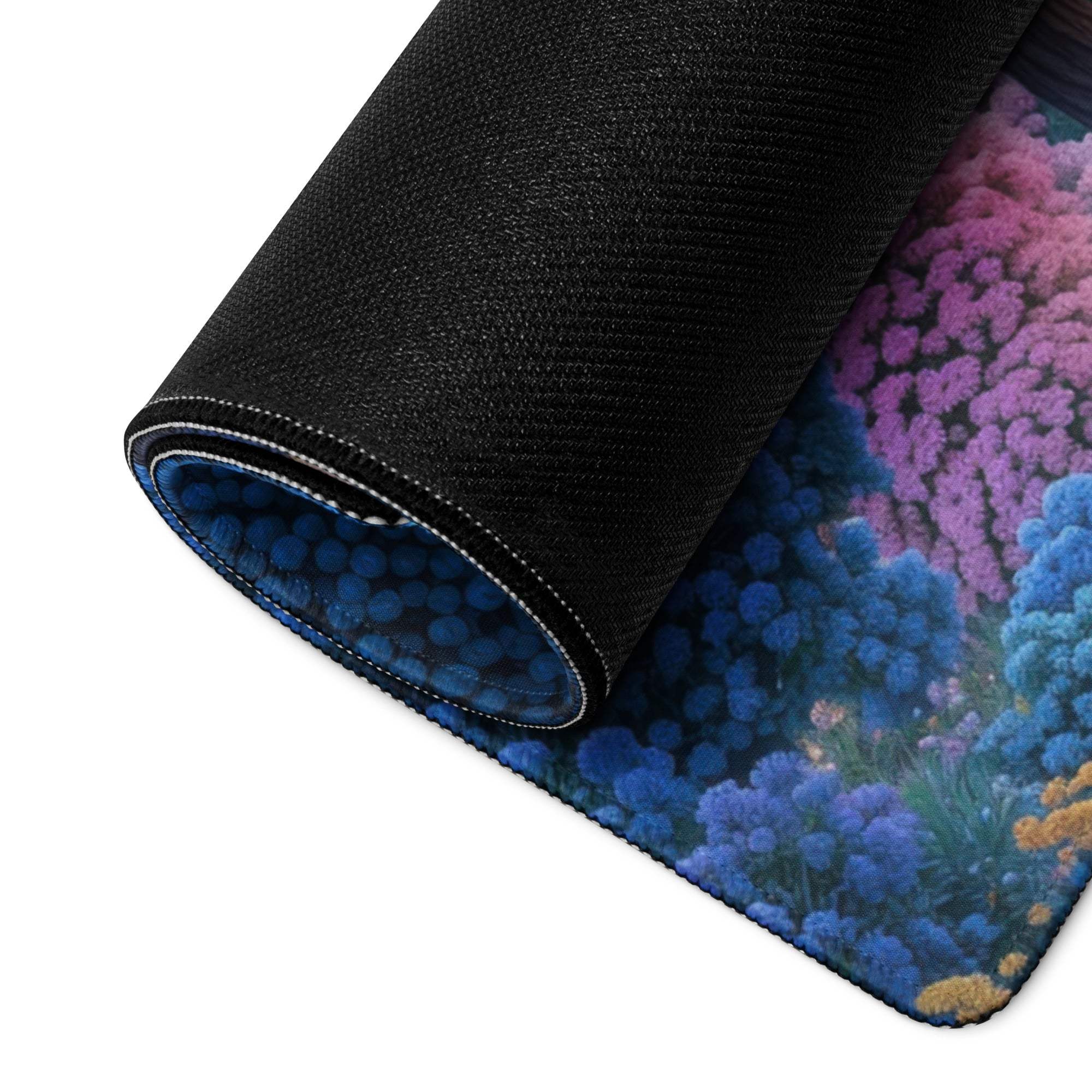 Dreamy Paris Nightscape large gaming mouse pad rolled up with vibrant purple blue floral design