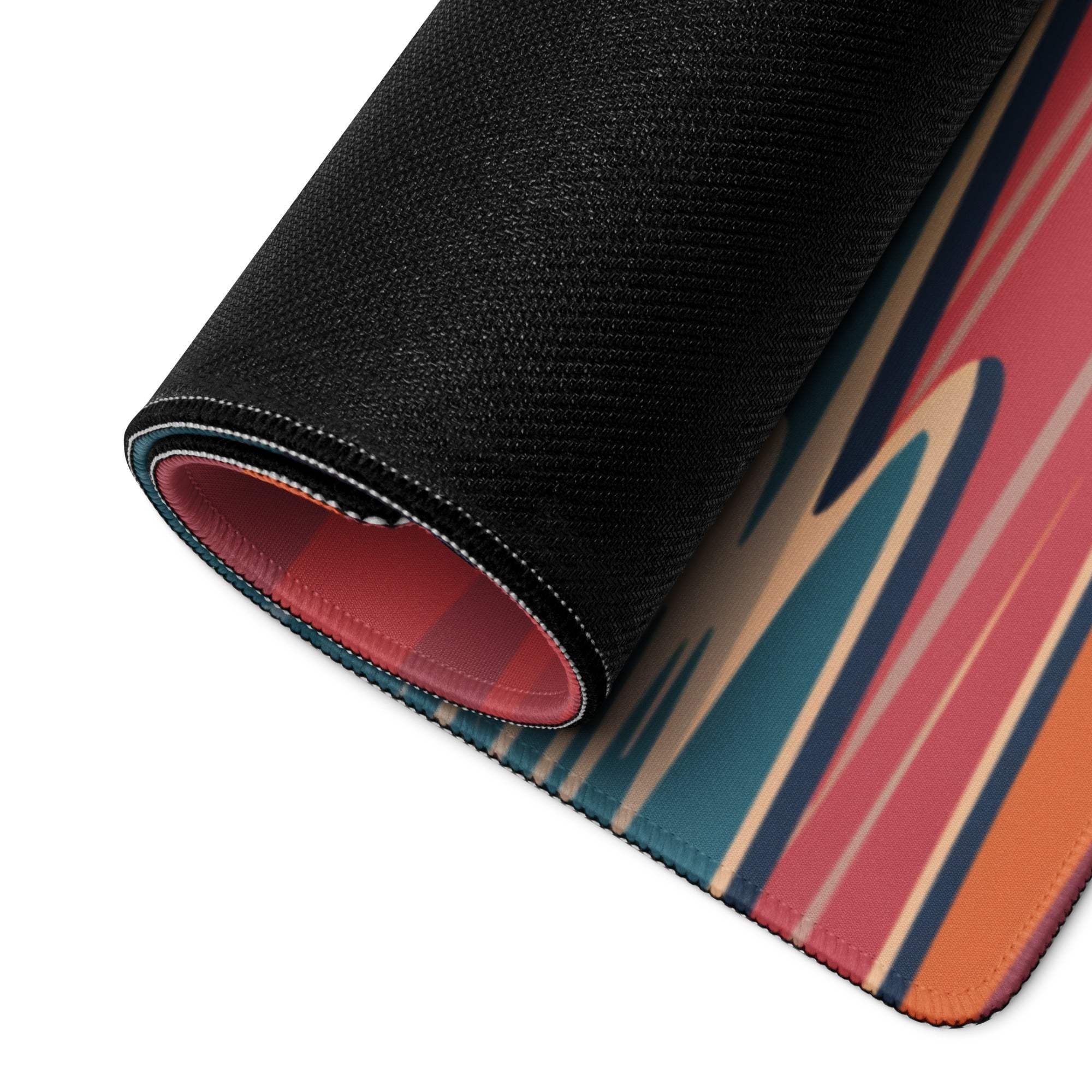 Rolled-up Tropical Sunset Beach gaming mouse pad with palm trees and vibrant stripes