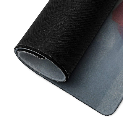 Back of large abstract landscape gaming mouse pad with black textured top, gray underside and stitched edges