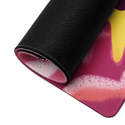 Rolled-up Cosmic Whimsical Space Adventure gaming mouse pad with vibrant pink design