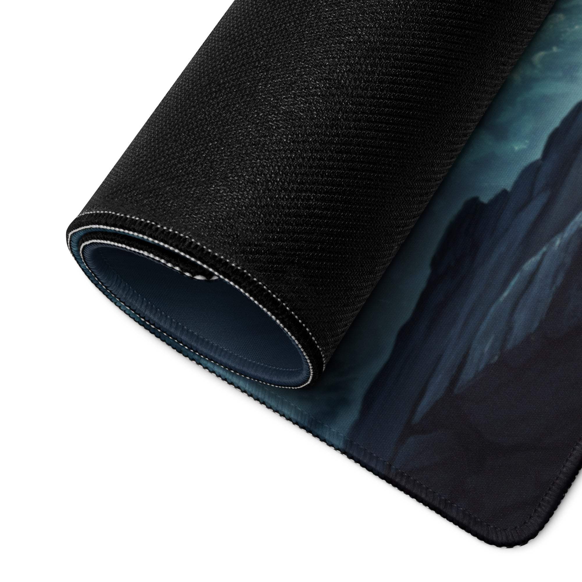 Black textured mousepad with dark blue stormy mountain landscape design