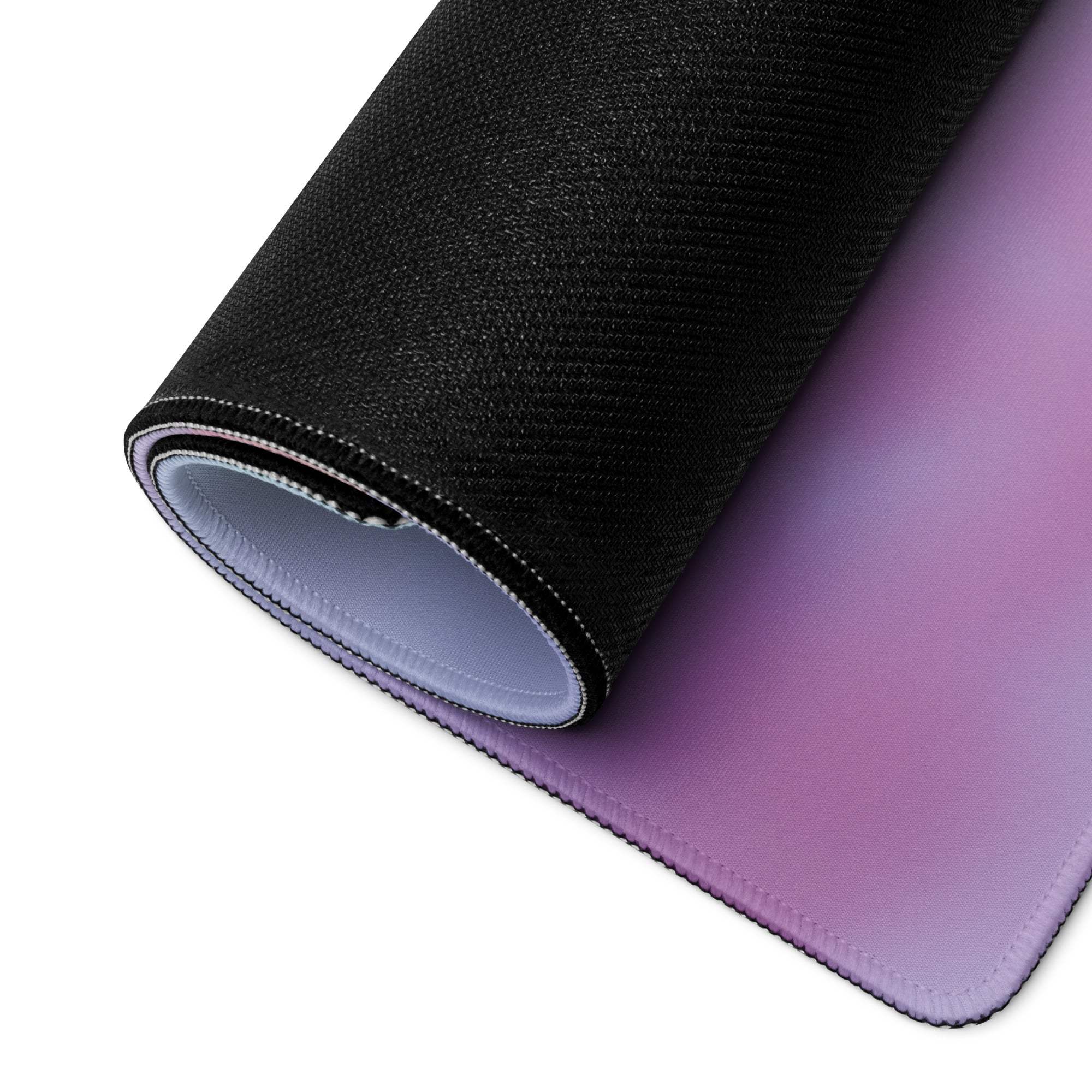 Rolled-up Dreamy Pastel Cloud gaming mousepad in black-purple gradient