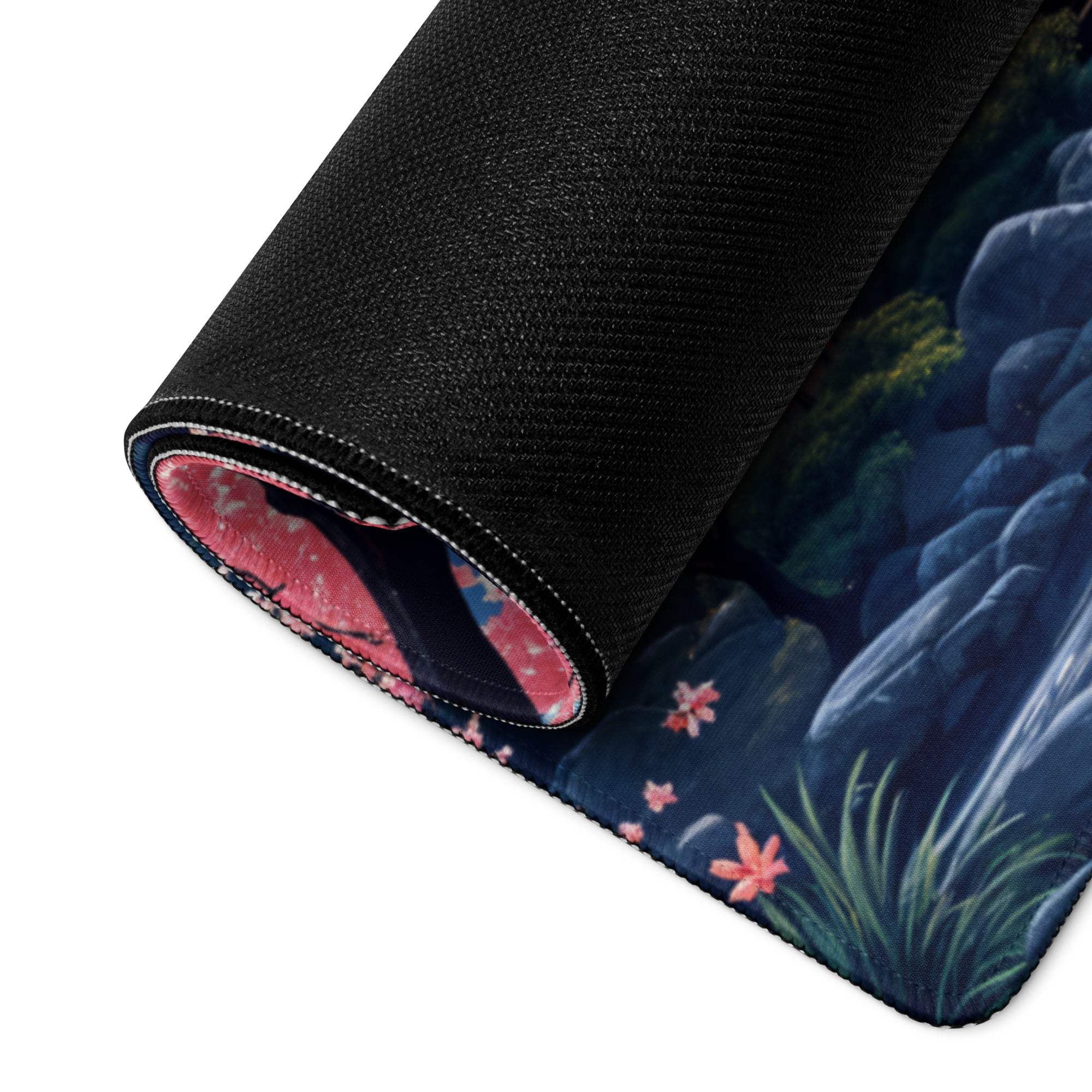 Rolled-up black gaming mousepad with anime sakura night Mount Fuji scene