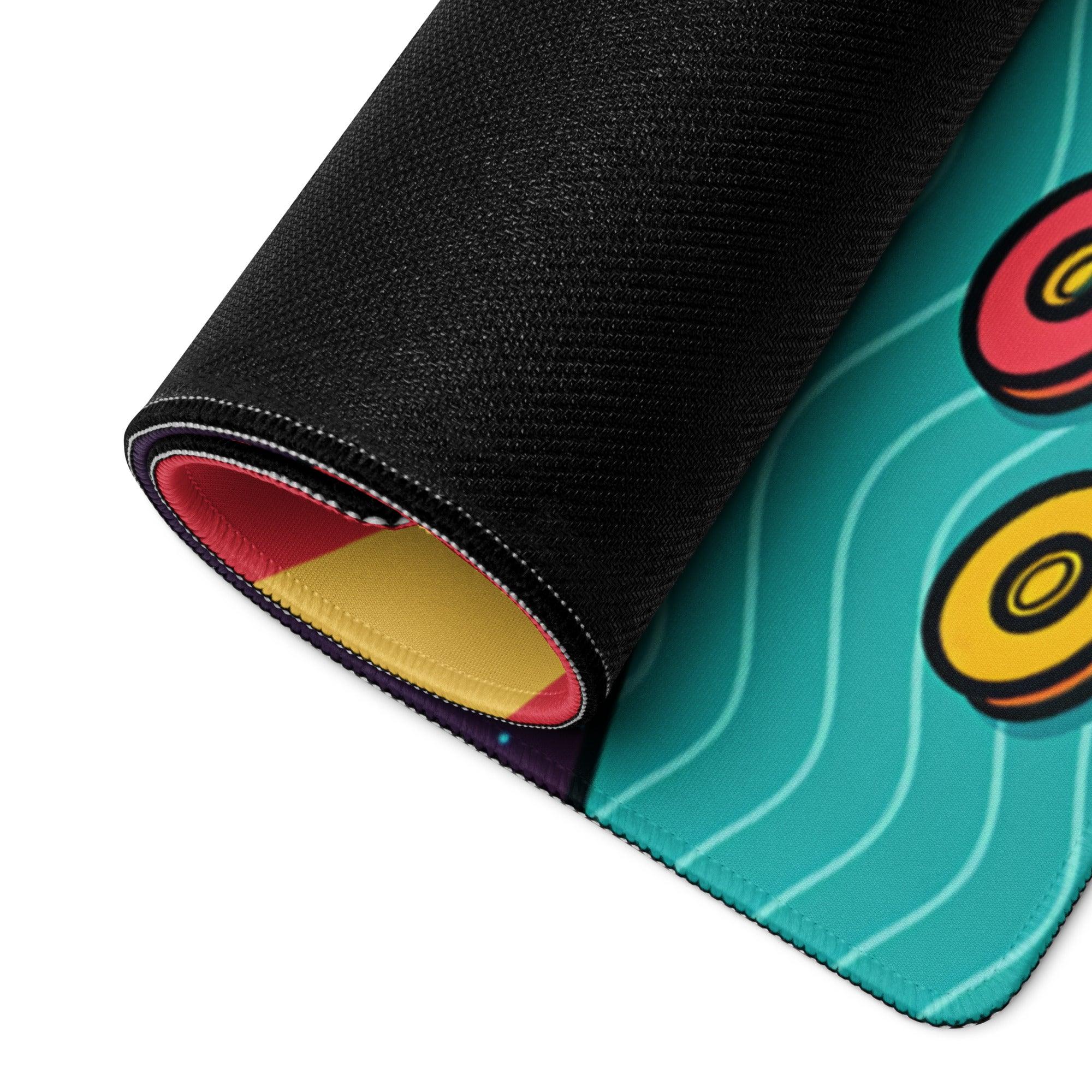 Pop art tropical sunset gaming mousepad rolled up showing teal donuts underside