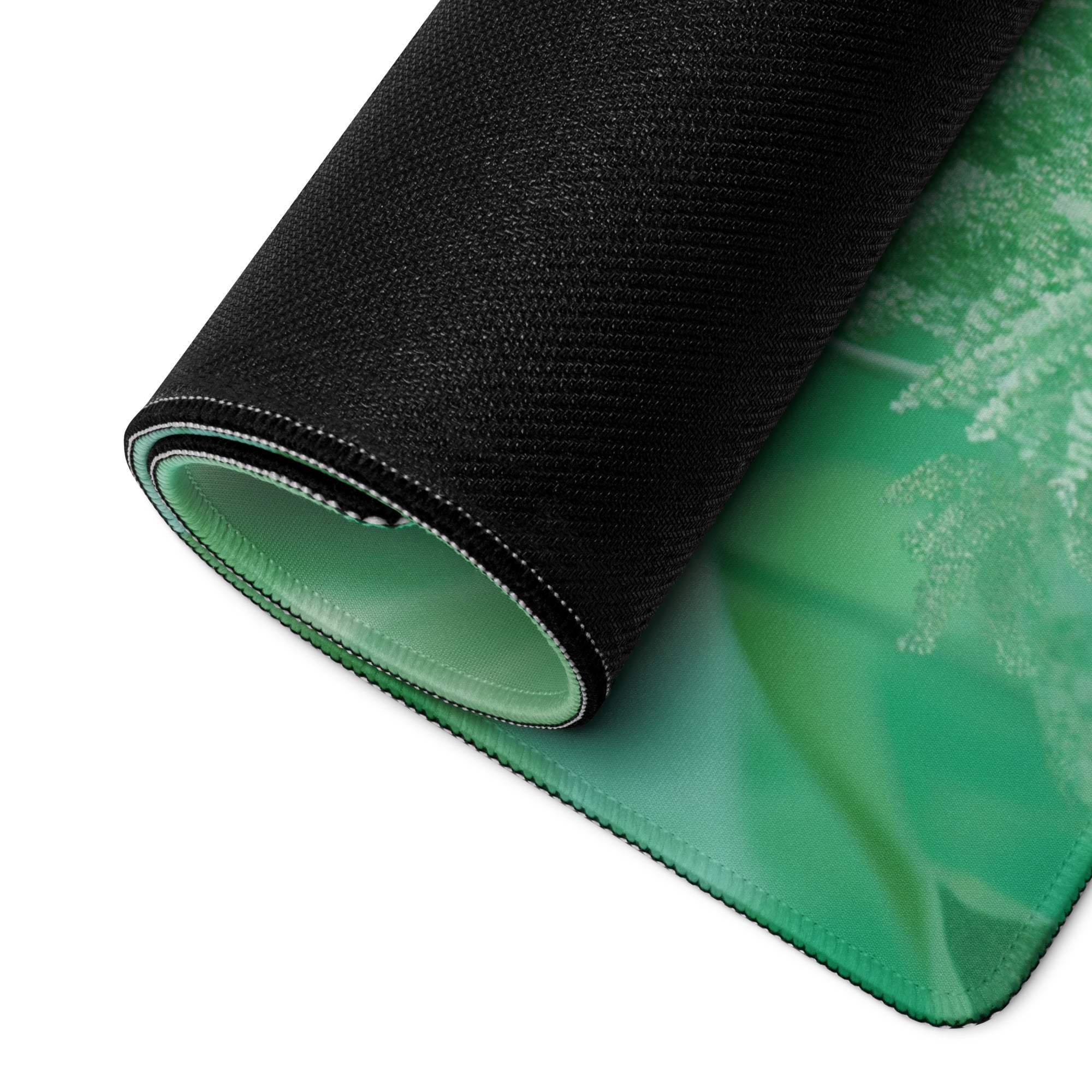 Rolled-up back of Floral Green large gaming mouse pad with non-slip base