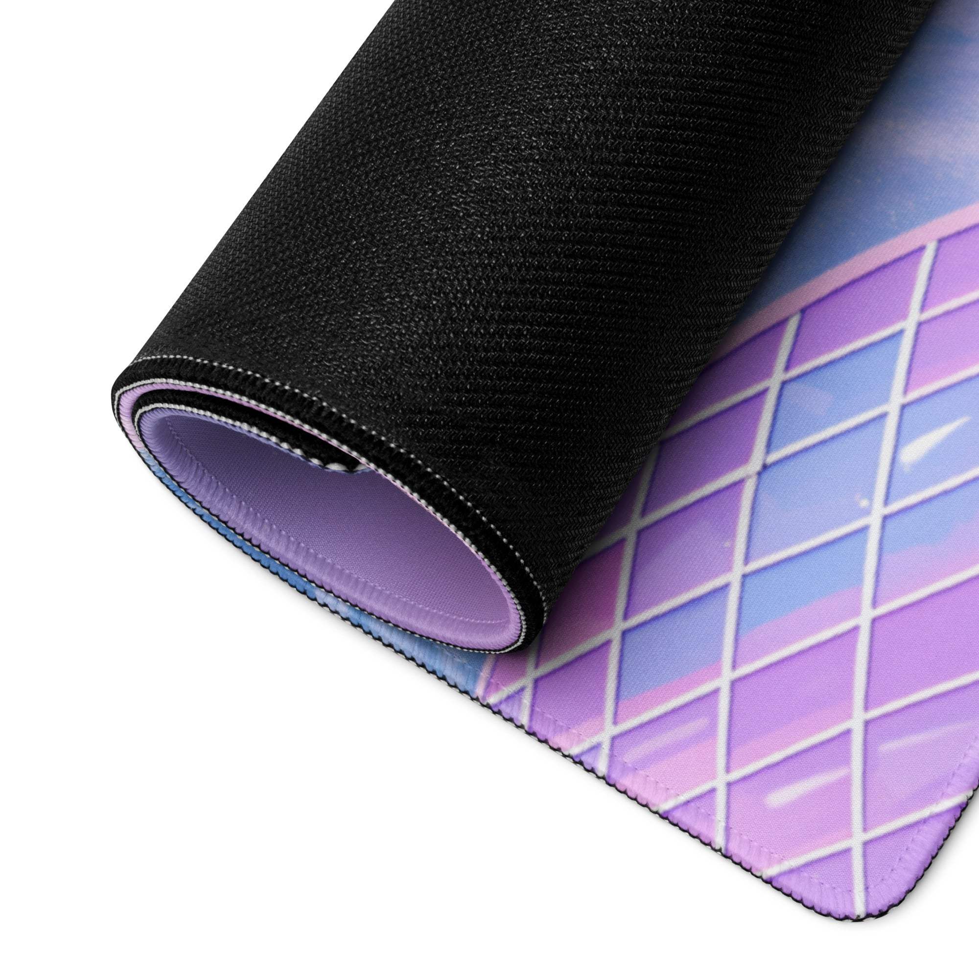 Pastel purple dragon gaming mousepad rolled up with purple-blue gradient grid