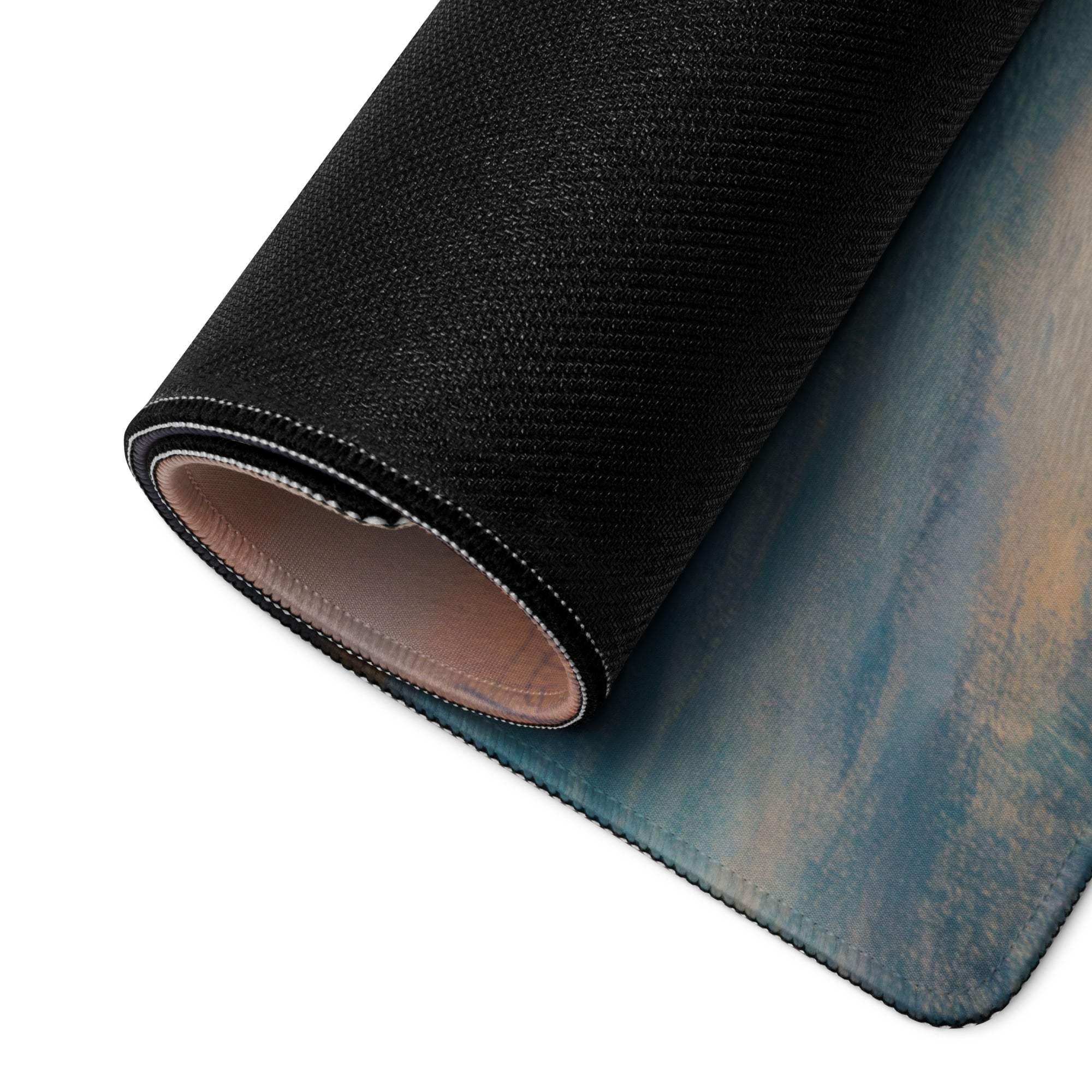 Large pastel sunset gaming mouse pad with black textured rolled edge, blue beige gradient, non-slip backing
