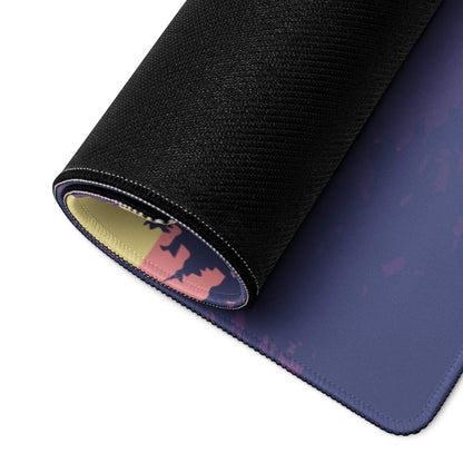 Back of vibrant sunset mountain gaming mousepad with black textured top and blue-pink gradient underside