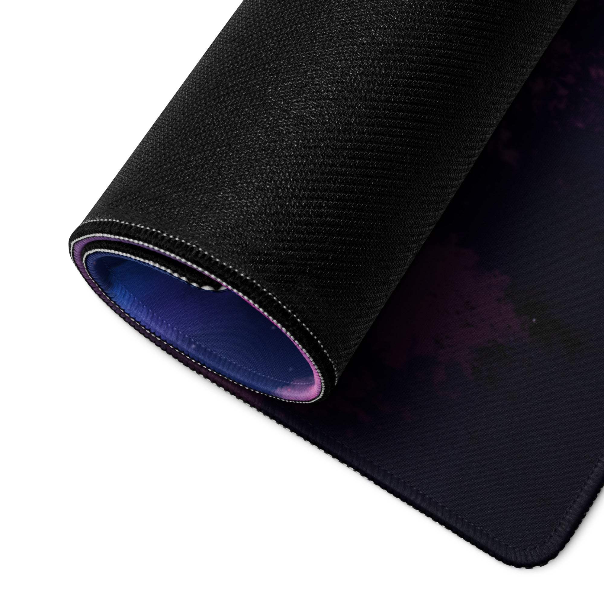 Black galaxy textured mousepad with blue lining and non-slip base