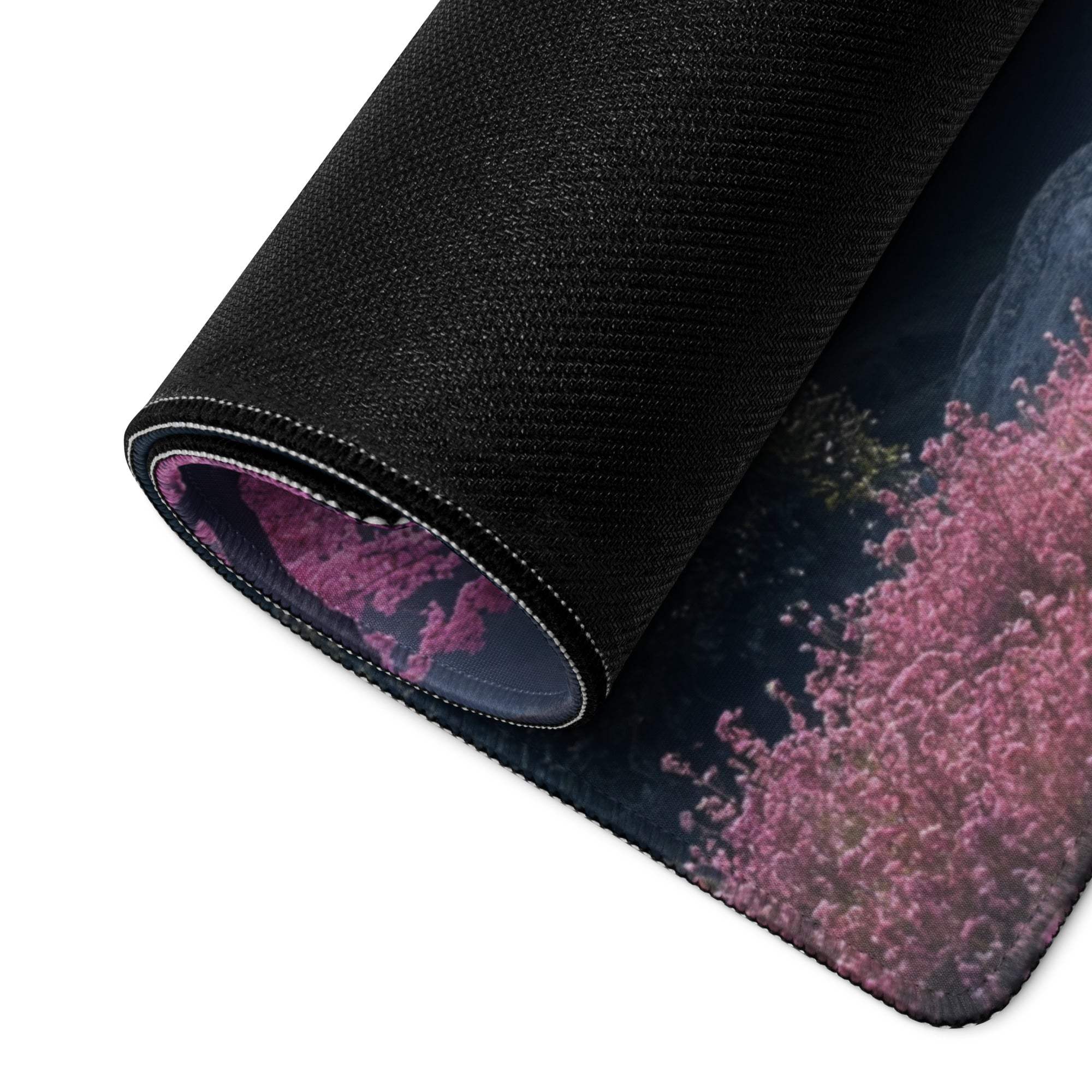 Rolled-up Dreamy Pink Cherry Blossom Landscape gaming mouse pad with non-slip base