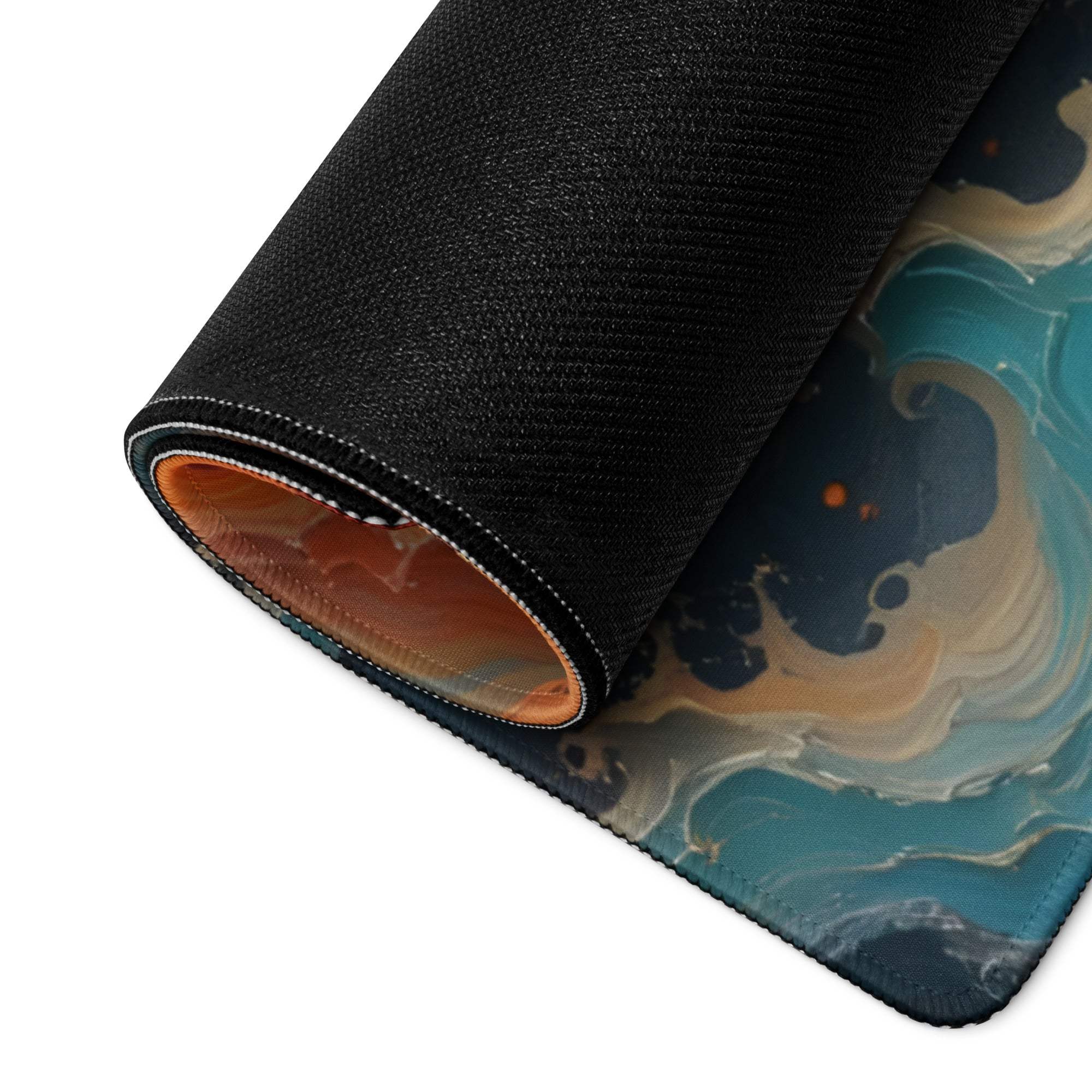 Black rolled large gaming mouse pad with abstract teal blue orange swirl design