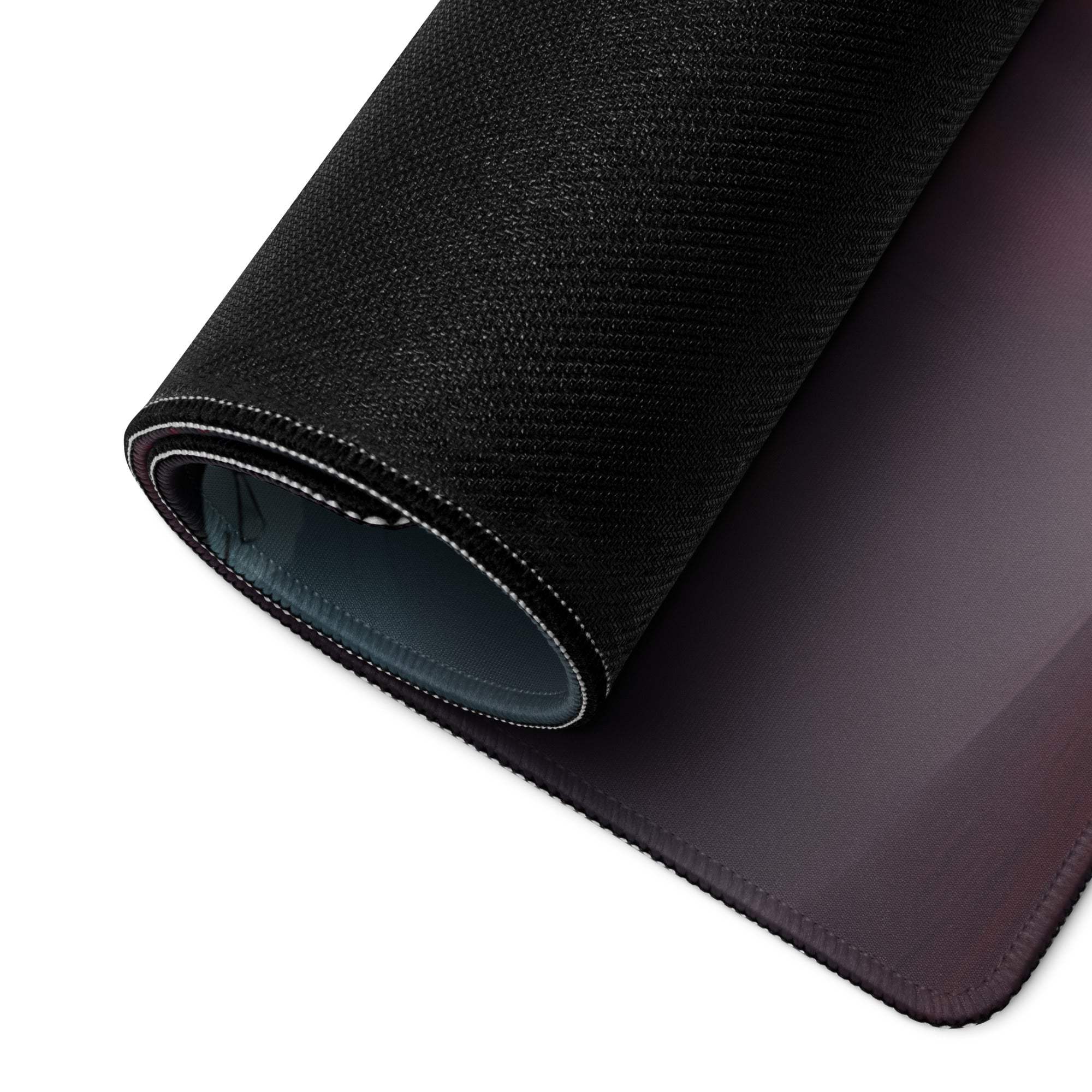 Black textured back of Epic Red Forest gaming mouse pad with stitched edges