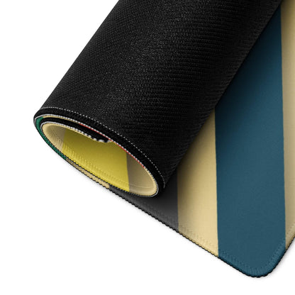 Bold geometric color burst gaming mouse pad with teal stripes, rolled yellow edge, non-slip base