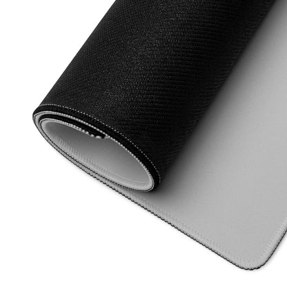 Black textured mousepad with smooth gray underside and stitched edges