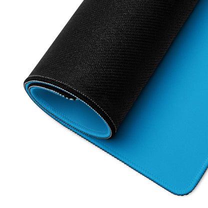 Large geometric blue pink gaming mouse pad with black blue textured back, non-slip base
