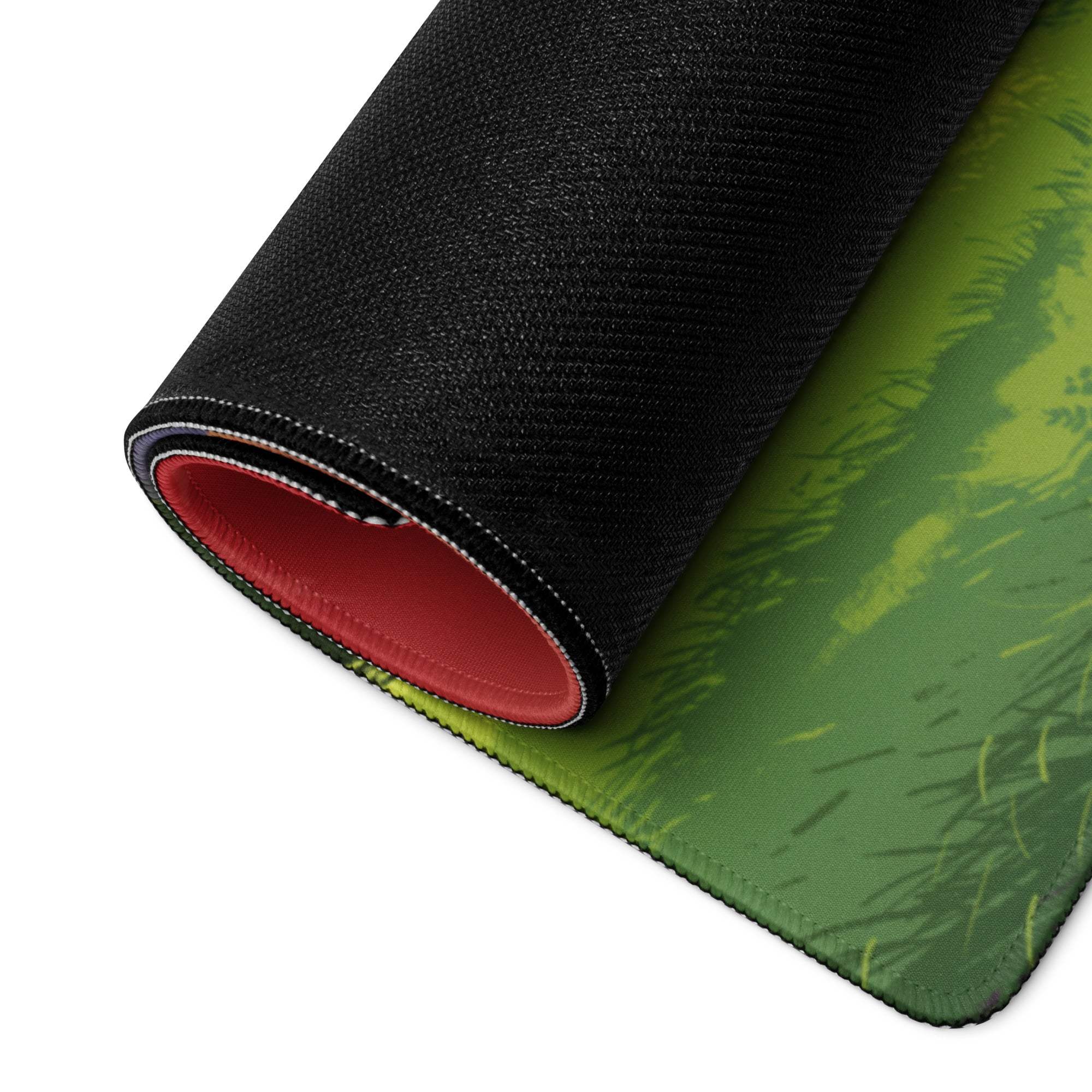 Vibrant sunset landscape gaming mouse pad with green grassy texture and stitched edge